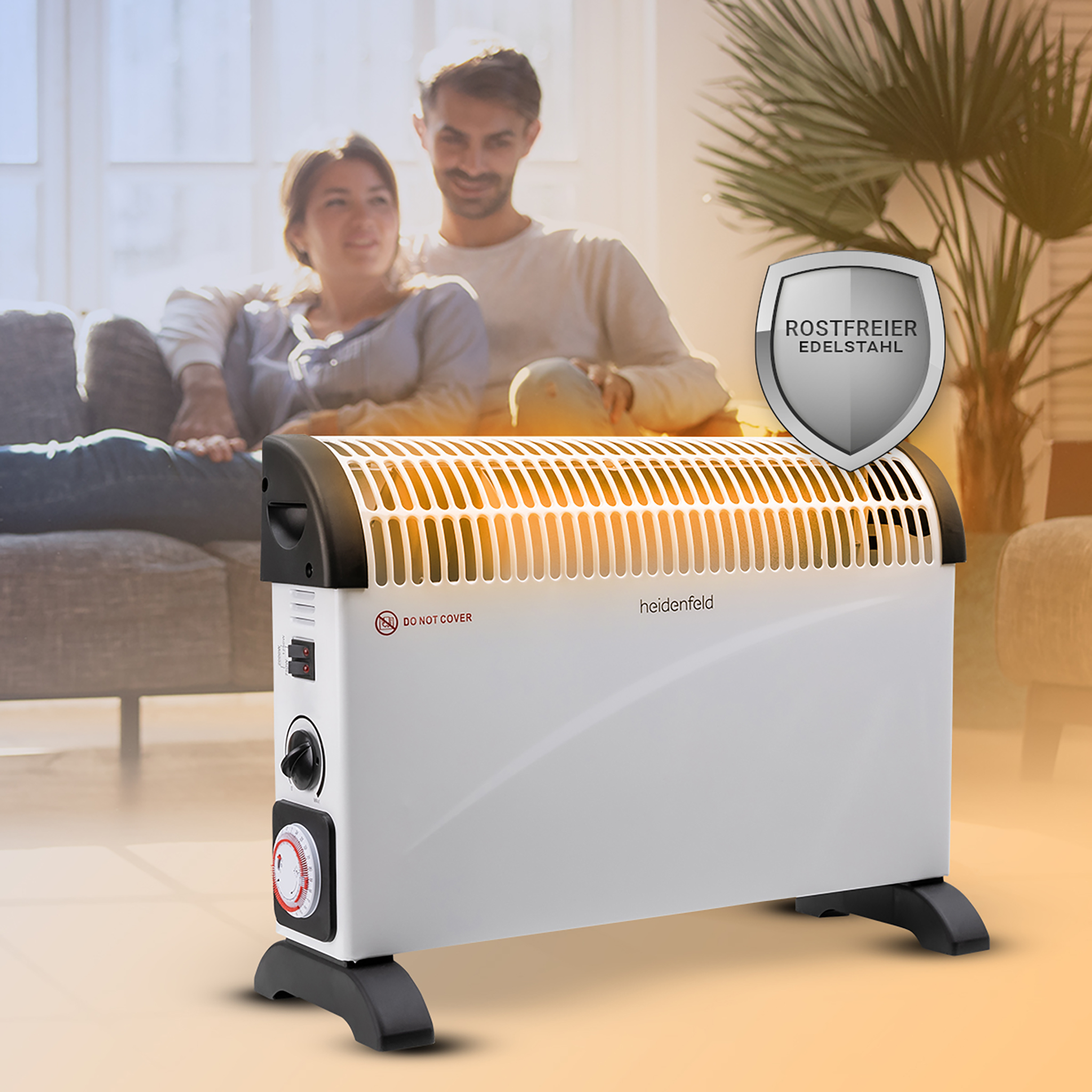 Die angeschaltete Elektroheizung w&auml;rmt das Wohnzimmer eines Paares auf